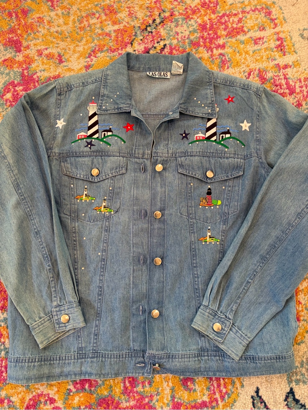 Vintage Las Olas embroidered denim jacket featuring a coastal lighthouse theme